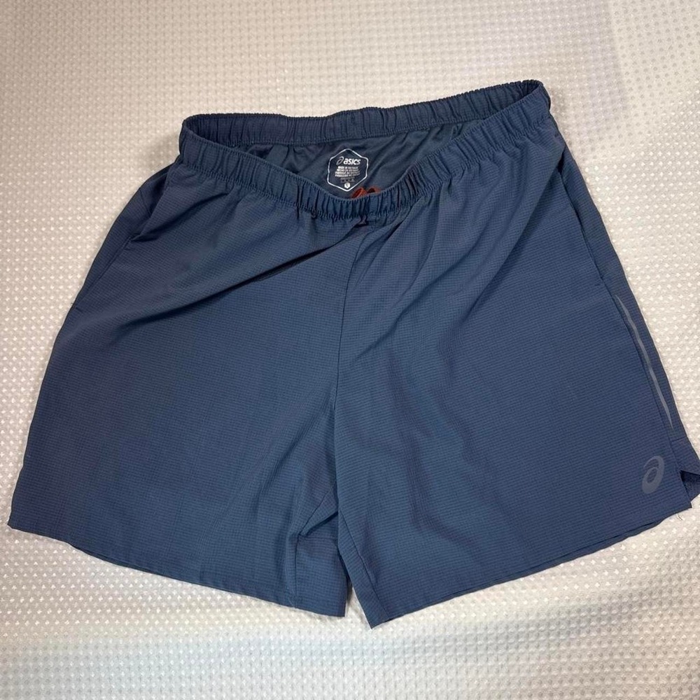 ASICS blue running shorts. Size L